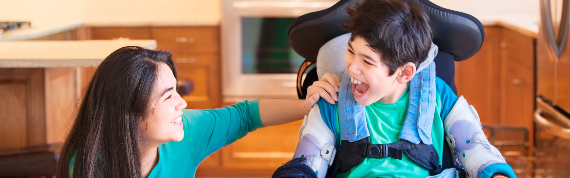 Person talking to a person on a wheelchair
