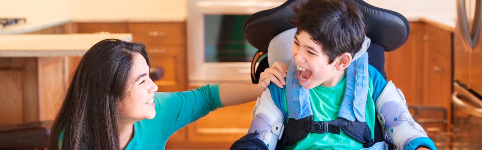 Person talking to a person on a wheelchair